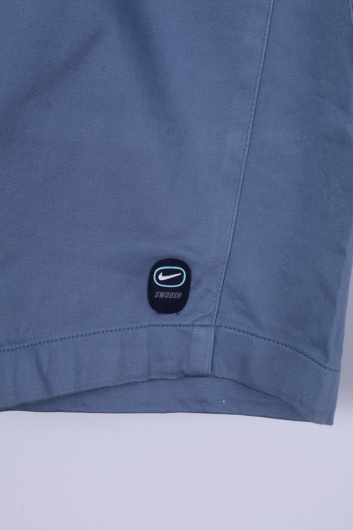 Nike Swoosh Short M pour homme en coton mélangé élasthanne bleu avec deux poches 