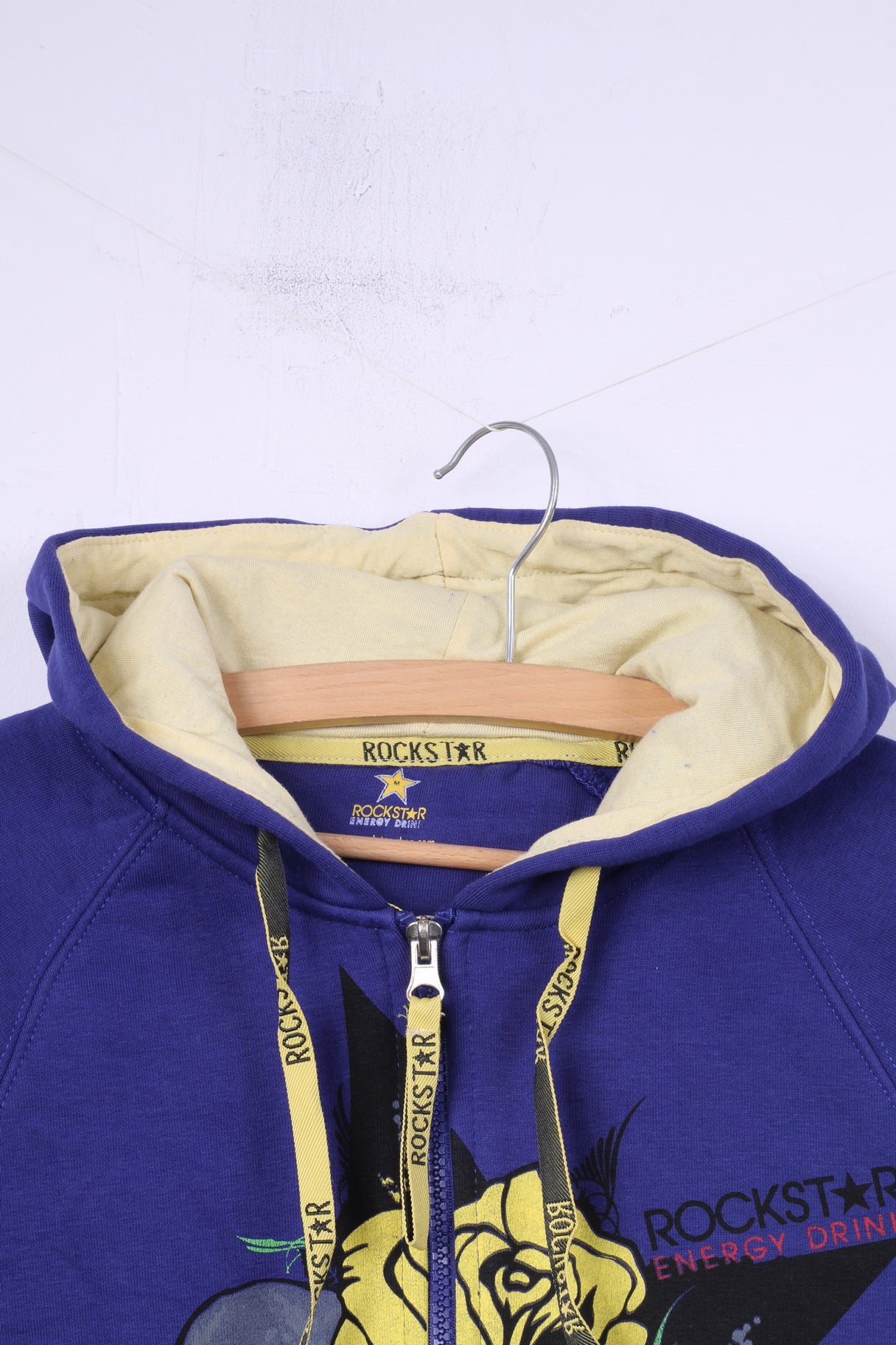 Felpa Rockstar Energy Drink da donna M Felpa con cappuccio grafico viola e cerniera intera
