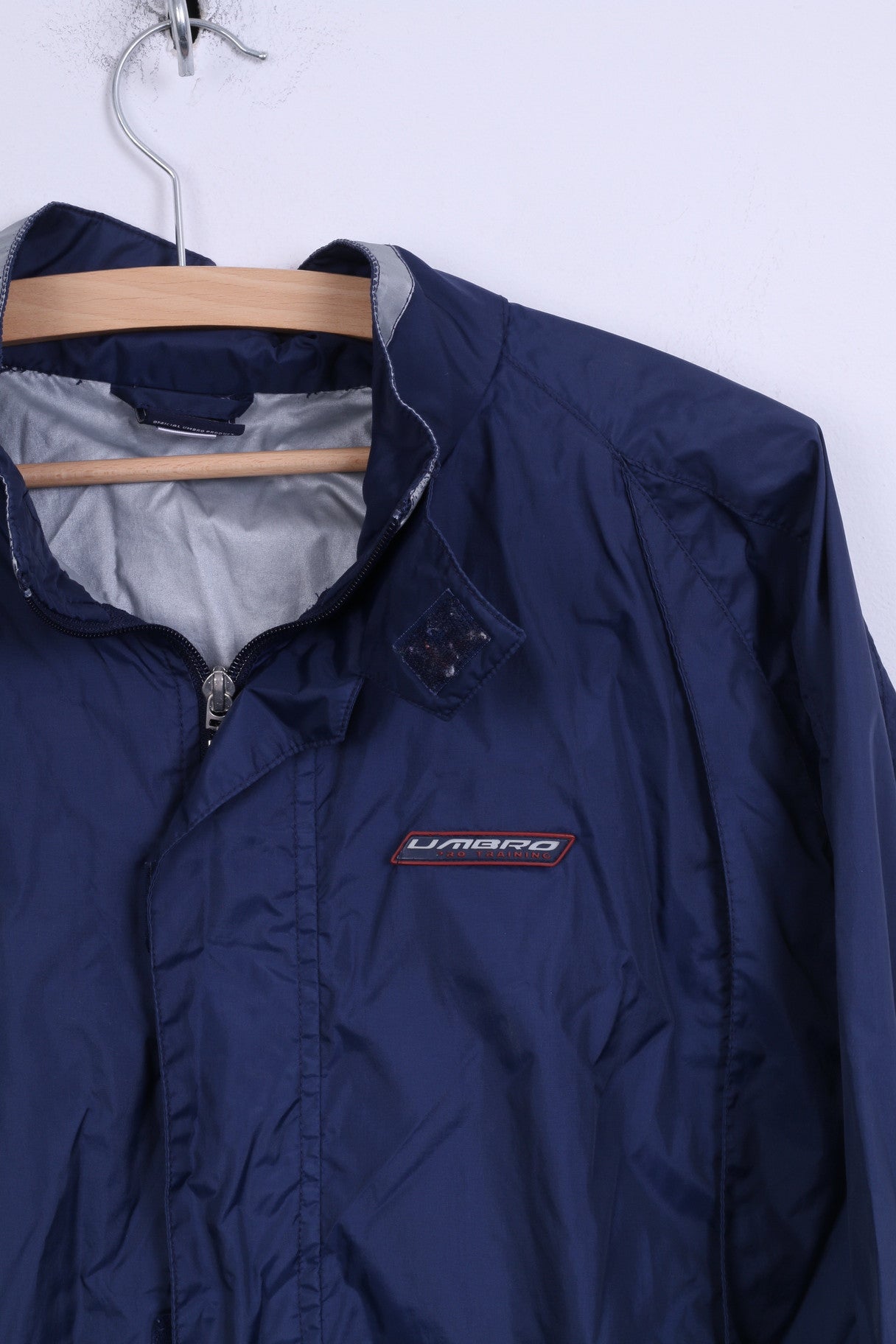 Giacca Umbro Boys YXL 158 Abbigliamento sportivo blu Nylon impermeabile con cerniera