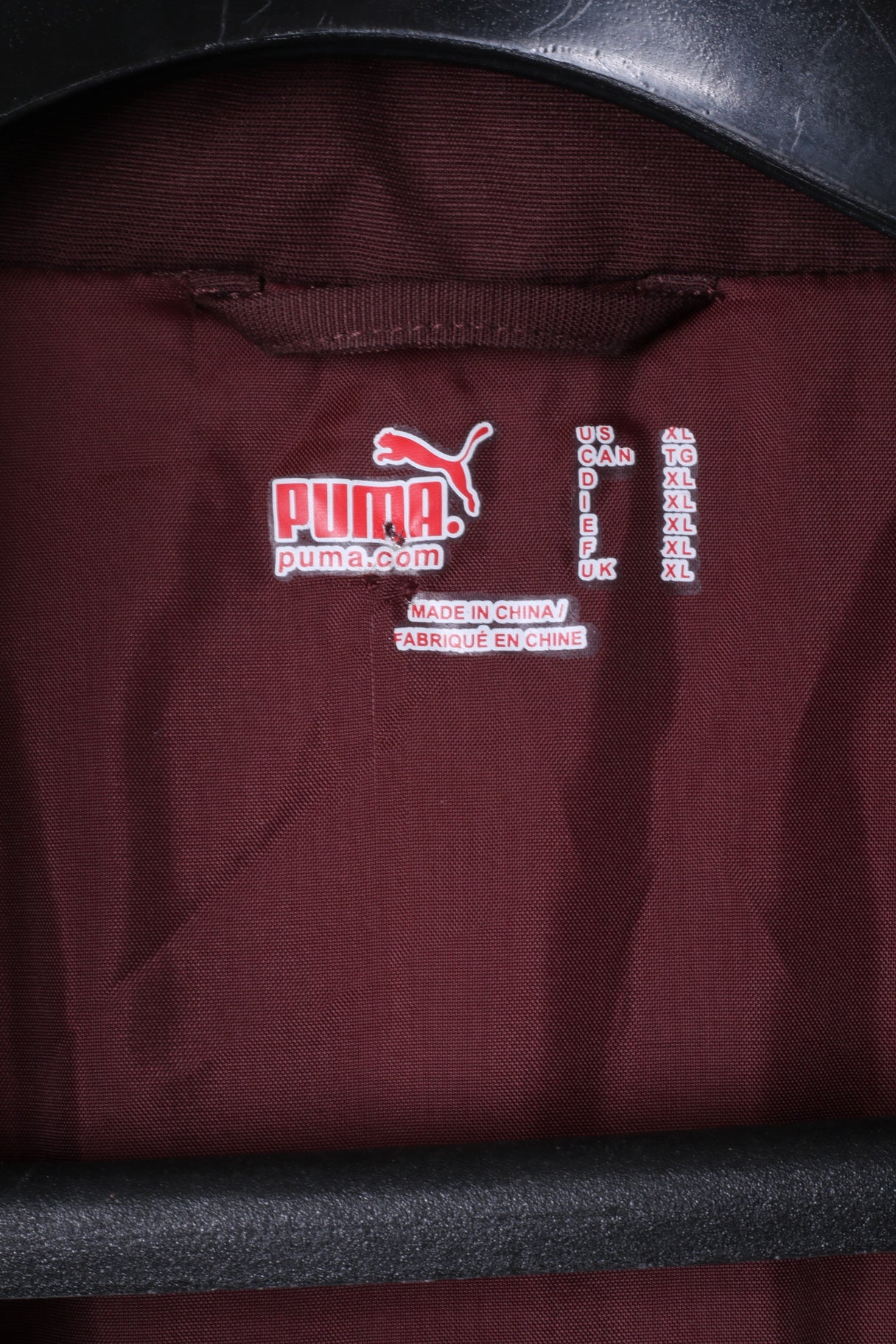 Giacca PUMA XL da uomo marrone con cerniera intera, cappuccio nascosto imbottito, logo sportivo arancione, parte superiore