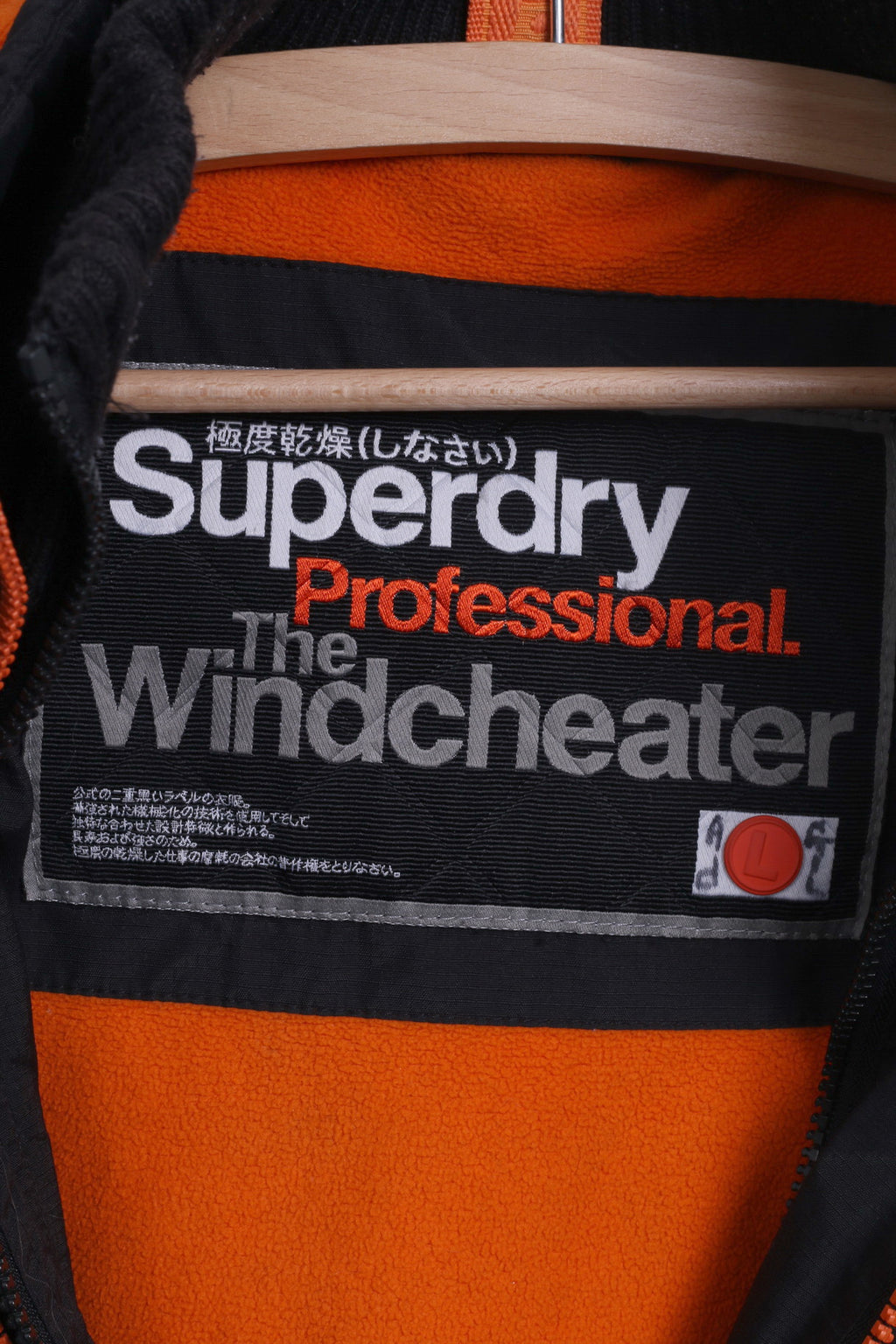 Giacca da donna Superdry L (M) in nylon nero con dettagli arancioni Giacca a vento con 3 cerniere
