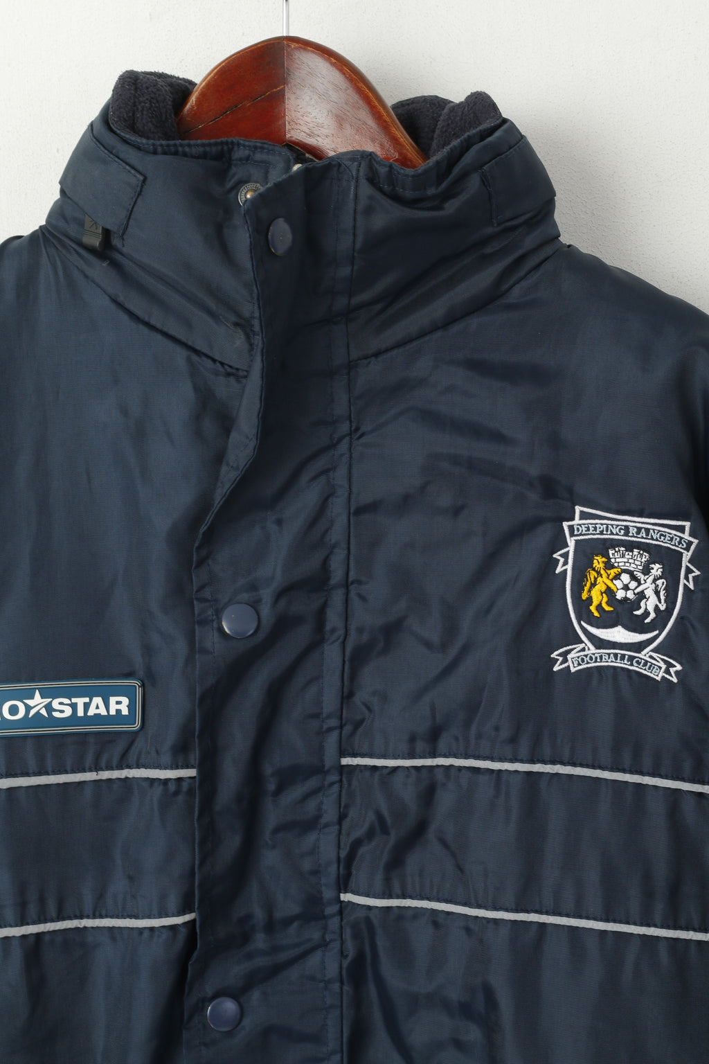 Veste Prostar Youth 152 bleu marine rembourrée Deeping Rangers Football Club avec capuche cachée