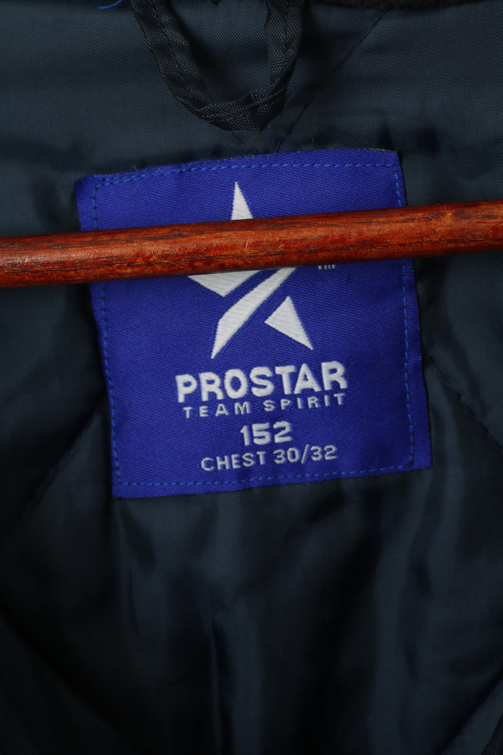 Veste Prostar Youth 152 bleu marine rembourrée Deeping Rangers Football Club avec capuche cachée