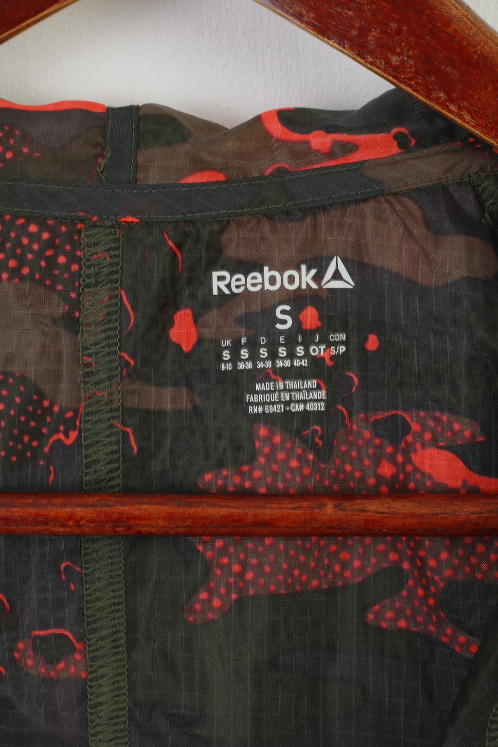 Giacca Reebok da donna verde nylon Combat Run Activewear con cappuccio e zip