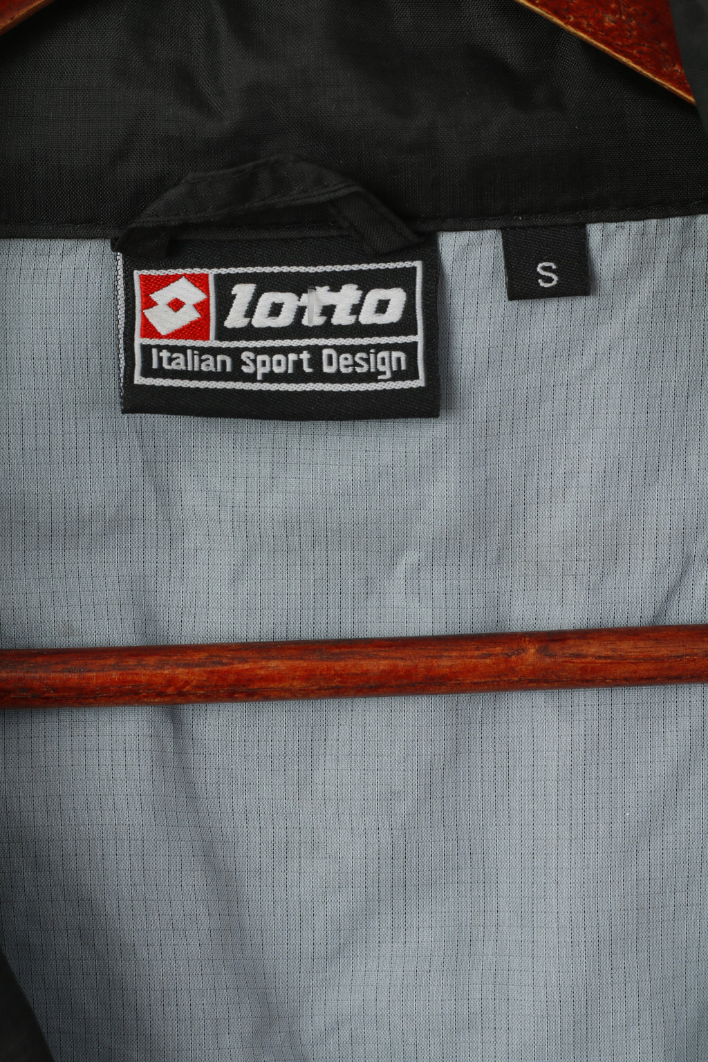 Lotto Veste pour homme en nylon noir imperméable avec capuche cachée