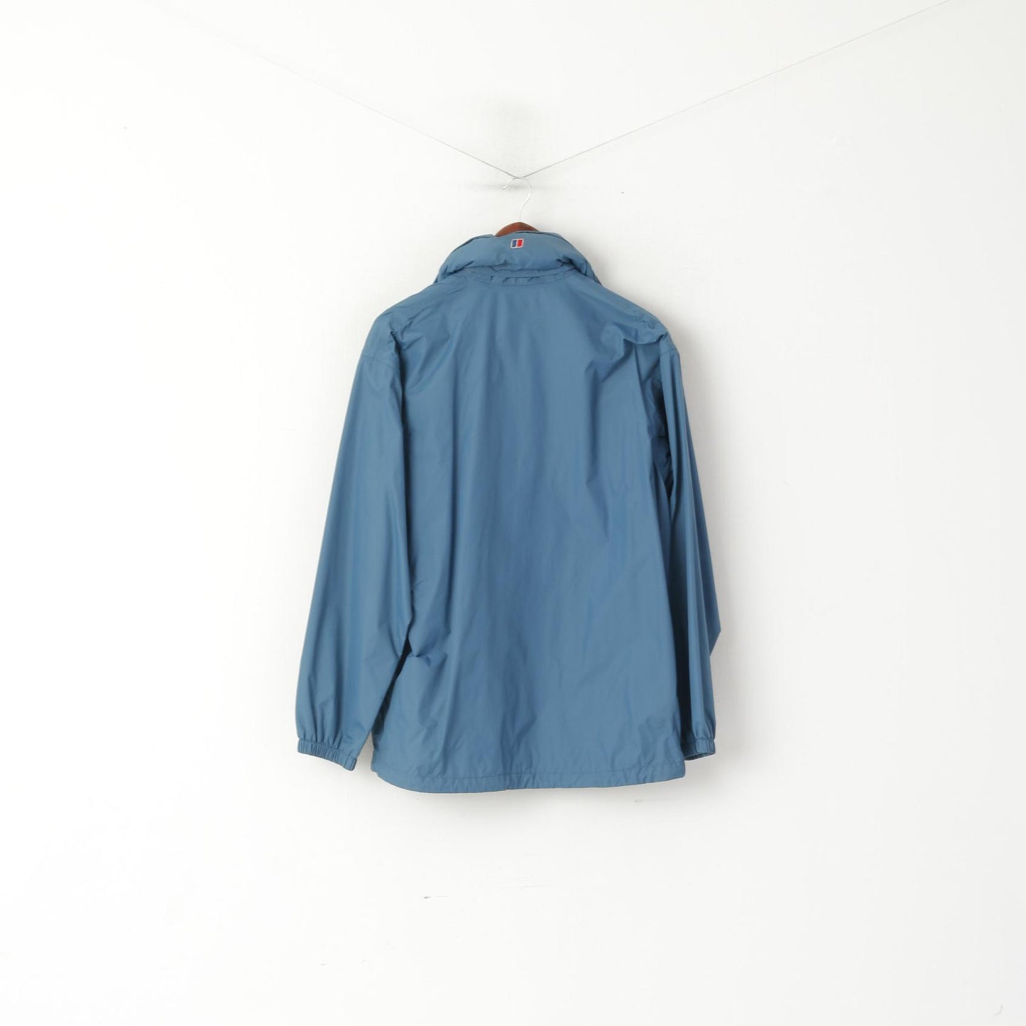 Berghaus Giacca da donna 14 L. Top esterno con cappuccio nascosto impermeabile in nylon blu sporco