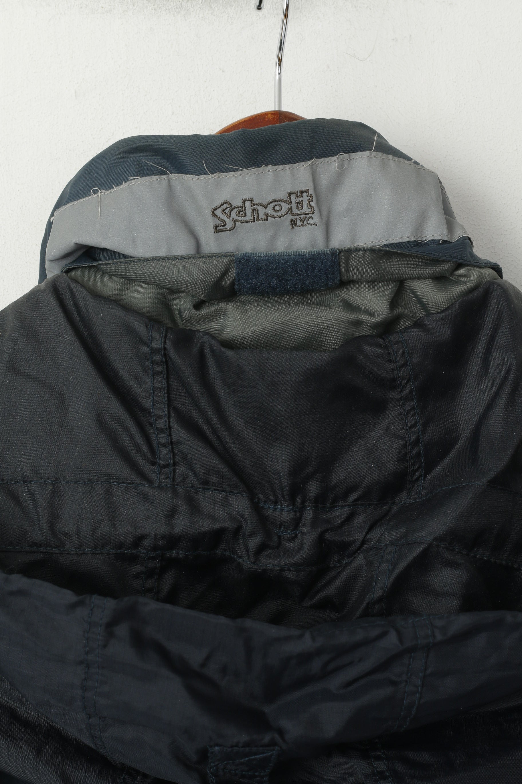 Giacca da uomo Schott NYC, collo riflettente in nylon blu mare, cappuccio nascosto con cerniera