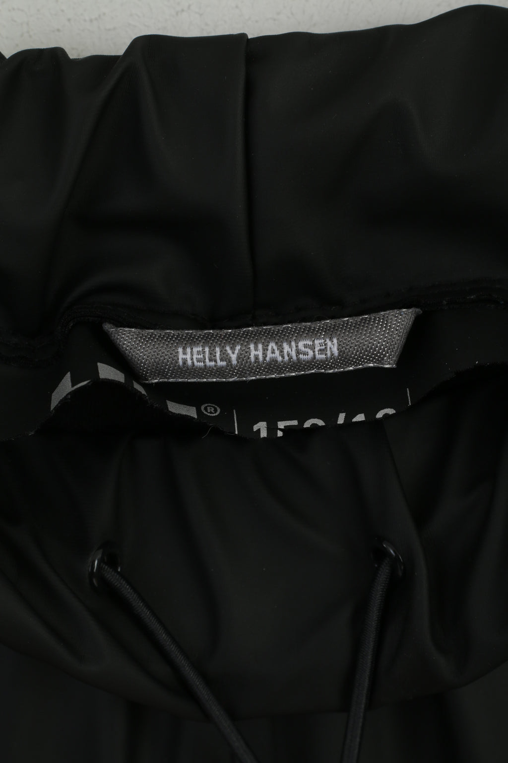 Pantaloni Helly Hansen Youth 150/160 Pantaloni da esterno impermeabili in nylon nero