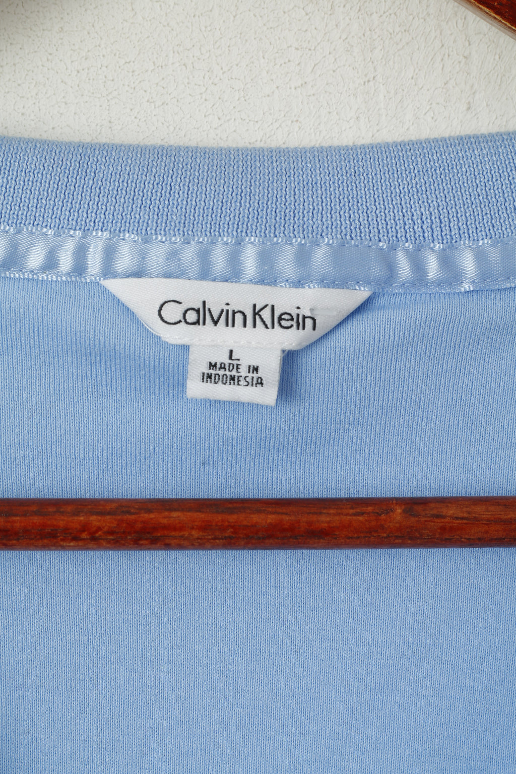 Polo Calvin Klein da donna L. Top corto a maniche corte in cotone blu