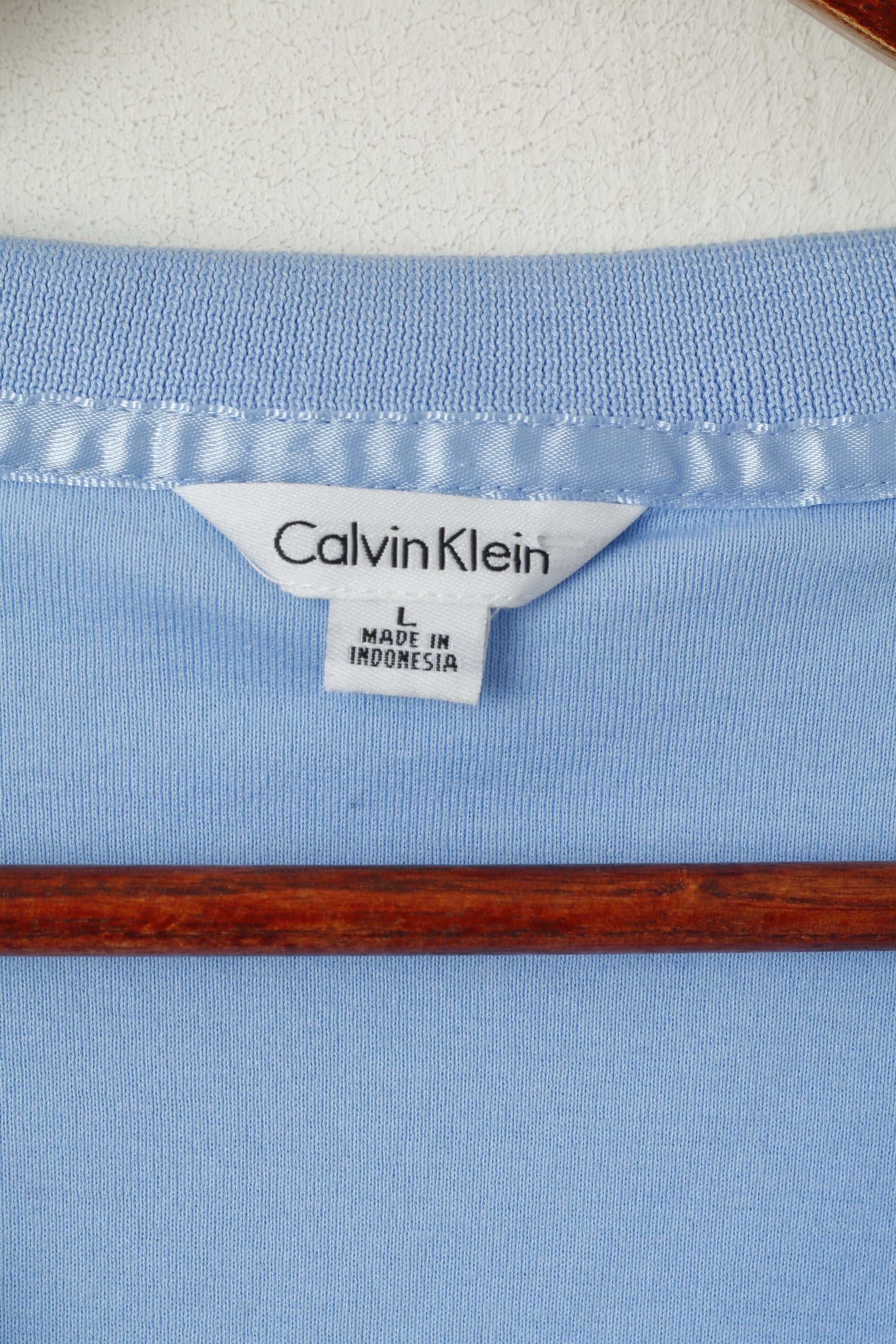 Polo Calvin Klein da donna L. Top corto a maniche corte in cotone blu