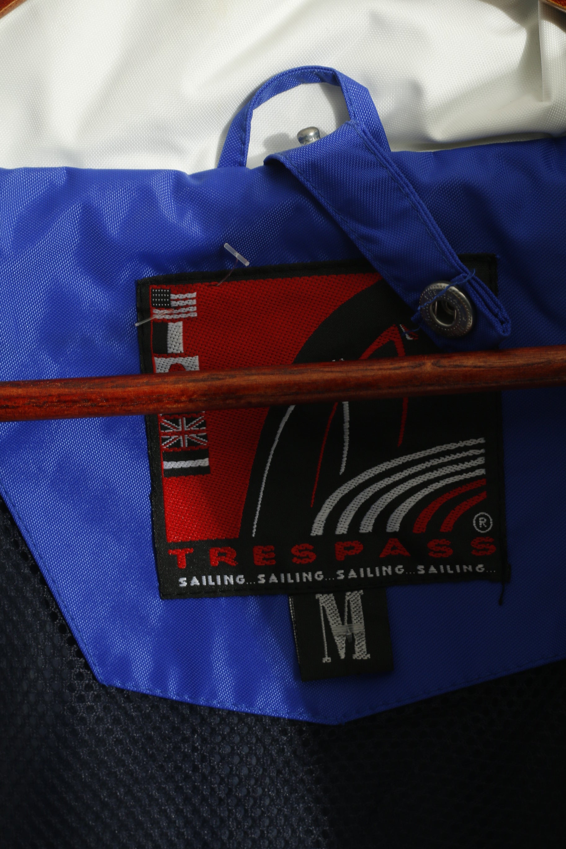 Giacca da uomo Trespass M in nylon blu da vela per esterni con cappuccio nascosto impermeabile