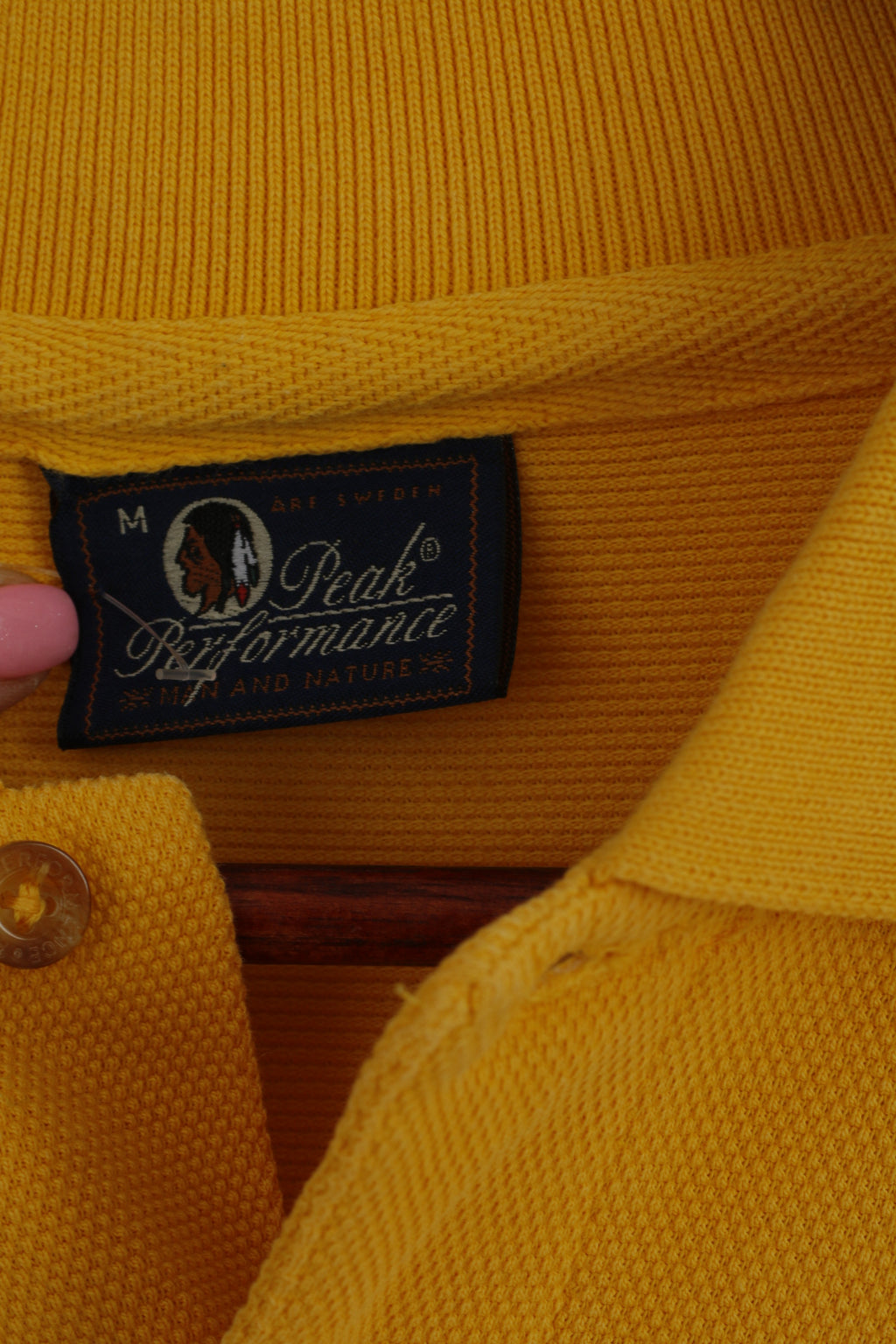 Polo Peak Performance da uomo M. Top in cotone giallo con bottoni dettagliati