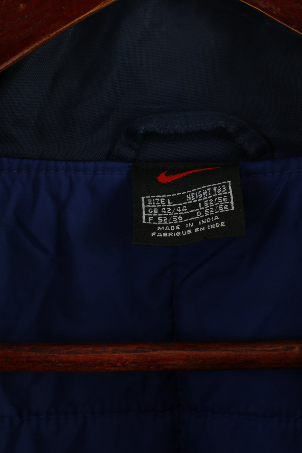 Giacca Nike Uomo L 183 Giacca blu navy in nylon impermeabile imbottita con cerniera intera retrò