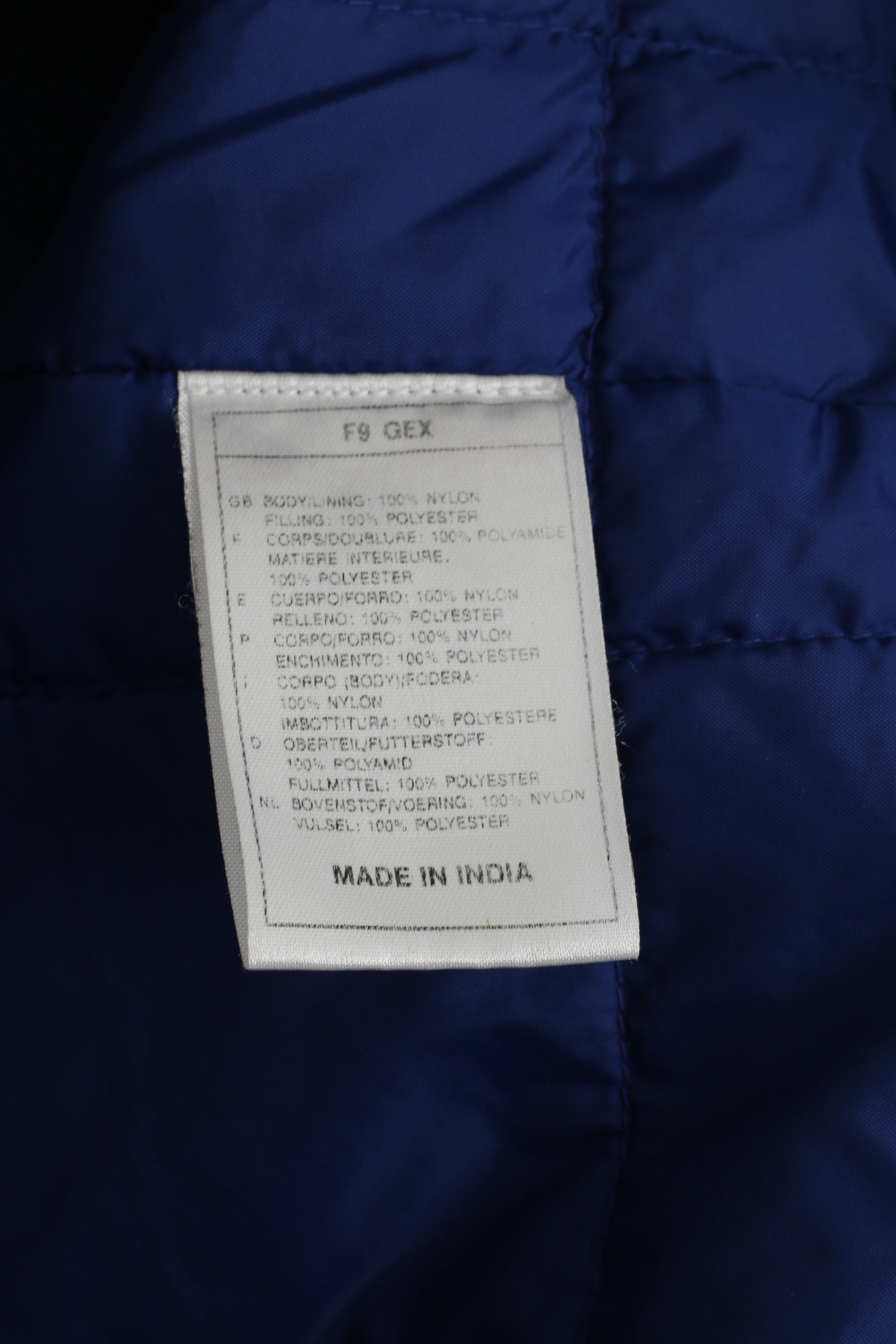 Giacca Nike Uomo L 183 Giacca blu navy in nylon impermeabile imbottita con cerniera intera retrò