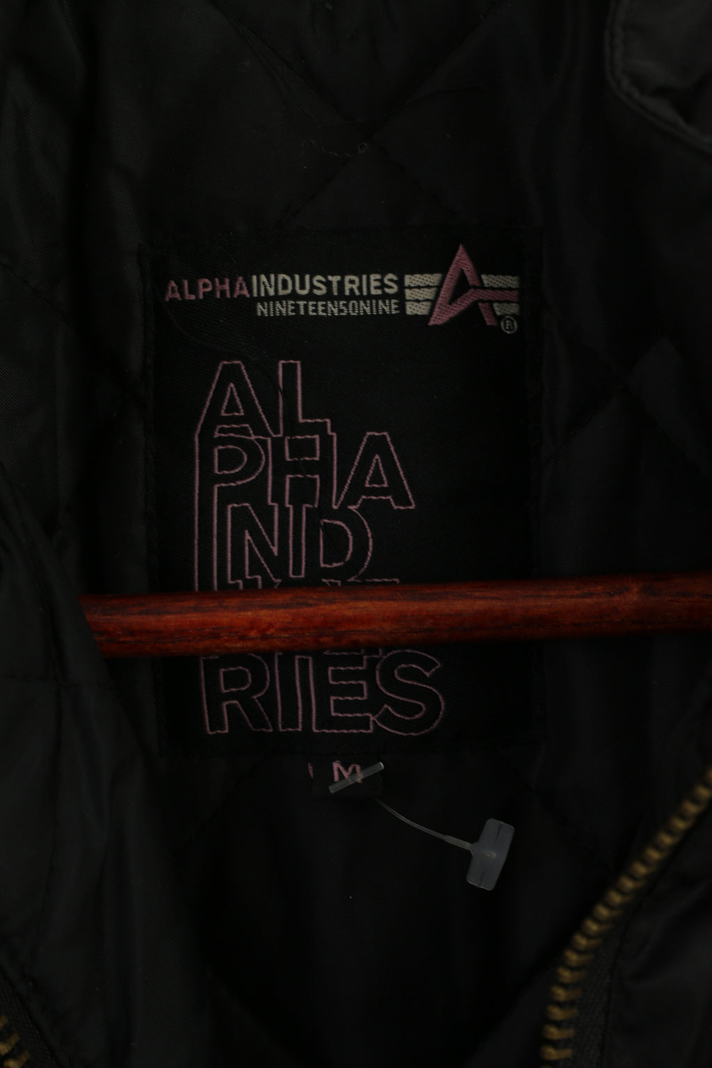 Giacca da donna Alpha Industries M nera da motociclista in nylon impermeabile con cappuccio nascosto imbottito